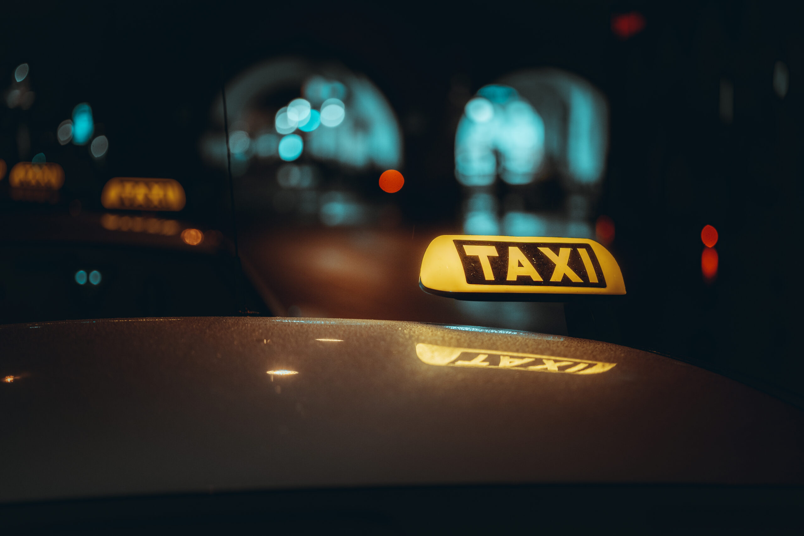 taxi sign night